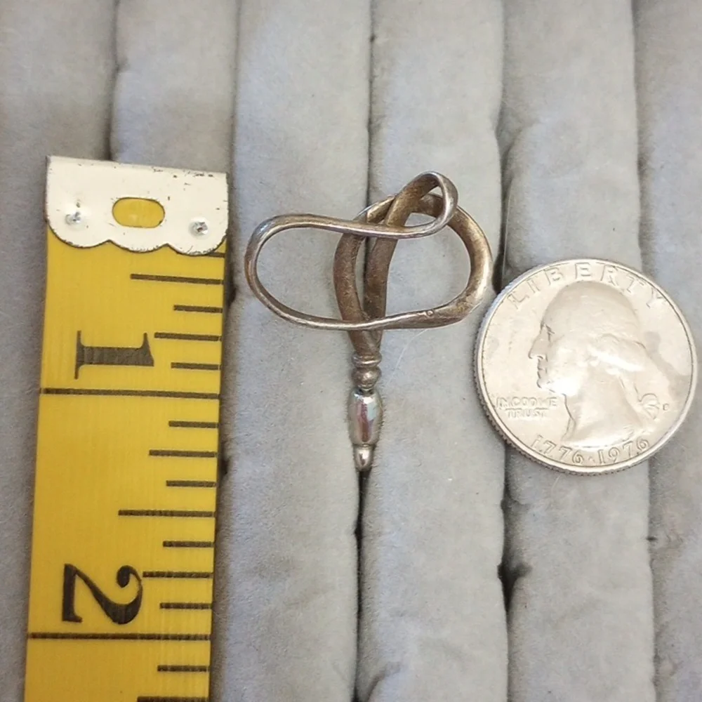 Vintage calla lily flower pin marked MoMA and sterling